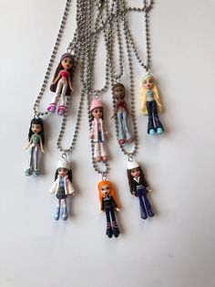 Mini Bratz toys made into ball chain pendant necklaces measuring approximately 22" in length. Bratz Accessories, Toy Necklace, Accessories Y2k, Fashion Enthusiast, Chain Pendant, Ball Chain, Chain Pendants, Wedding Shop, Pendant Necklaces