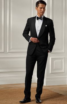 With its impeccable tailoring and satin touches, this tuxedo is hand-cut from the label's custom-developed wool barathea to exude black-tie sophistication. Jacket has one-button closure; shawl collar; nonfunctional four-button cuffs; chest welt pocket; front welt pockets; interior Trousers have zip fly with hook-and-bar closure; side welt pockets; back button-welt pockets; adjustable waist tabs Jacket is lined; trousers are lined to the knee 100% wool Dry clean Made in Italy Designer Clothing Shawl Tuxedo, Groom Tux, Black Tie Attire, Black Tie Formal, Tuxedo Wedding