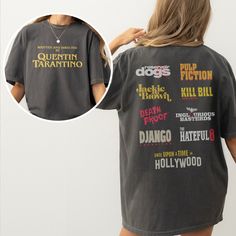 the back of a woman's t - shirt with words on it and an image of her