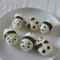 there are panda bears made out of rice on the plate