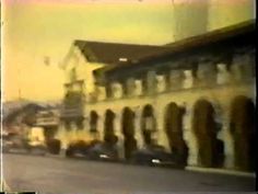 a blurry photo of cars parked in front of a building