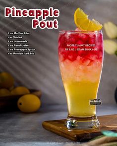 the pineapple pout is served in a tall glass with an orange slice on top