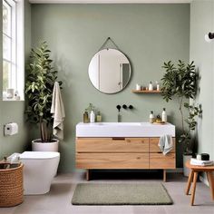 a bathroom with green walls and white fixtures