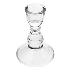 a clear glass candle holder on a white background