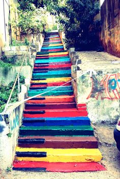 the stairs are painted with different colors and designs