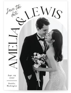 a black and white photo of a newly married couple kissing in front of an arch with the words save the date on it