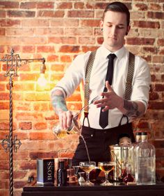 My office needs THIS GUY!!! If plain beer isn't sufficient, offices could employ a full-time mixologist to mix drinks at an open bar. Because alcohol = better workers. ... Bartender Uniform, Male Uniform, Bar Uniform, Uniform Ideas, Inspired By Charm, Stylish Mens Suits, Trust Issues, Stylish Mens Outfits