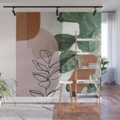 a wall mural with green leaves on it and a plant in the corner next to it