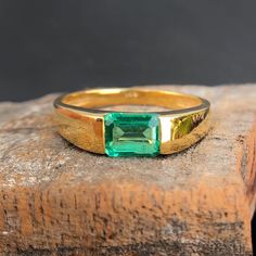 This Ring is made of 7x5mm Lab Emerald Gemstone, The Metal Is available in 10k,14k,18k Solid Gold.(Yellow Gold, White Gold and Rose Gold) Emerald Ring, 9k/14k Solid Gold Emerald Wedding Ring for men,7x5mm 1.5ct Emerald cut Gemstone July Birthstone gift Ring for Woman and man Product Details: - Material:- 9k/14k/18k Solid Gold Main Stone:-Lab Emerald Stone size:- 7x5mm (Emerald Cut) Stone Weight :-  1.5 Carat  Approx Side tone:- None Ring size:- Available in all Sizes. Please have a look on More Mens Emerald Ring, Classic Yellow Gold Emerald Ring With Rectangular Stone, Classic Emerald Ring With Rectangular Stone, Emerald Cut Signet Ring For Anniversary With May Birthstone, Emerald Cut Signet Ring With May Birthstone For Anniversary, Rose Gold Emerald Ring, Mens Emerald Rings, Smaragd Ring, Emerald Wedding Rings