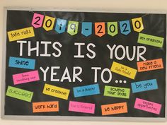 this is your year to bulletin board with colorful sticky notes on the front and back