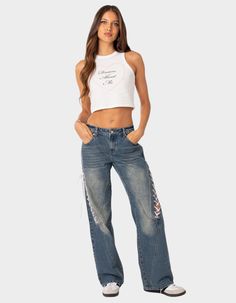 Nothing Says Effortlessly Chic Like These Ribbon Lace Up Jeans. Pair Them With A Basic Tee, Or A Cute Party Top, And You'll See Why These Jeans Are A Staple In Every It Girl's Closet. Jeans. Low Rise Waist. Straight Fit. Ribbon Lace Up Detailing. 100% Cotton. Model Wears Size S. Model Height Is 5'7. Item Care: Machine Wash At Maximum Of 30ºc, Do Not Bleach, Tumble Dry Low, Iron At A Maximum Of 110ºc, Do Not Dry Clean. | Edikted Low Rise Ribbon Lace Up Jeans Ribbon Jeans, Late Night Shopping, Low Rise Wide Leg Jeans, Lace Up Jeans, Flannel Sweatshirt, Dream About Me, Graphic Trends, Mini Bow, Indian Photoshoot