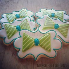 decorated cookies with green and white bow ties