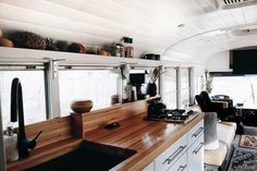 the kitchen is clean and ready to be used as a living room or dining area