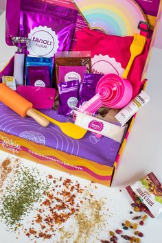 a box filled with lots of food and condiments on top of a table