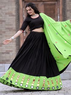 Introducing our stunning "lovely black mirror work rayon traditional lehenga choli with dupatta," a must-have piece for your special occasions. This fully stitched black lehenga features intricate mirror work that adds a touch of elegance and glamour. The matching rayon choli with embroidered threadwork border complements the lehenga beautifully, while the light green rayon dupatta with mirror work adds a pop of color to the ensemble.
This traditional outfit includes its XS to XL sizing, 3.5-met Cotton Semi-stitched Lehenga With Gota Work, Cotton Lehenga With Gota Work, Semi-stitched, Black Cotton Sets With Mirror Work, Festive Black Sharara With Mirror Work, Black Sharara For Festive Navratri Occasions, Black Sharara For Festive Navratri, Black Sharara With Mirror Work For Navratri, Black Traditional Wear With Mirror Work For Navratri, Traditional Black Sharara With Pallu