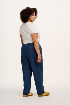 Addison Is Our High Waist Trousers With Elasticated Back And Tapered Leg. Referred To As “Magic Trousers” By Those With Big Hips And Withoutavailable Here In Mid Wash Blue Denim!our Fithigh Waisted With A Wide Waistband To Sit Over The Waist, Extra Ease With Elasticated Side Panelspleated Front To Allow Loose Fitting Over The Hipstapered Full Length Leg With Room To Rolldeep Side Pocketsfabric & Caremade From 100% Gots Certified Organic Cotton Denimthe Fabric Is Soft, Breathable And Durablemachi Lucy And Yak Addison Jeans, Lucy Yak, Lucy And Yak, Dungarees Shorts, High Waist Trousers, Tapered Jeans, High Waisted Trousers, Wide Waistband, Tee Dress