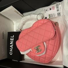 CHANEL Large Pink Heart Bag  🖤 Guaranteed Authentic and will be shipped directly to eBay for authentication and dispatch. 🖤 Extremely rare, very limited production, and in brand new condition 🖤 Season 22S - Large size bag 🖤 Comes with dustbag, box, care booklet, felt, ribbon and camelia. 🖤 Pink quilted lambskin 🖤 Measures 6.4 × 7 × 2.5 in  🎥 The packing and shipping of this item will be videotaped. 💯 All items are GUARANTEED AUTHENTIC. ✅ All sales final. Please review all photos carefull Chanel Mini Heart Bag, Chanel Valentine Bag, Pink Chanel Bag, Pink Pouch, Vintage Chanel Bag, Trendy Purses, Chanel Store, Luxury Bags Collection, Bag Display