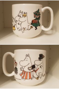 two coffee mugs with cartoon characters painted on them