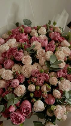 a large bouquet of pink and white flowers