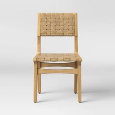 a wooden chair with woven seat and back