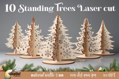 the 10 standing trees laser cut are ready to be made into christmas decorations or gifts