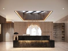 an elegant lobby with marble counter tops and chandelier