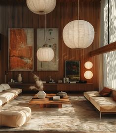 a living room filled with furniture and hanging lights