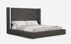 a bed with an upholstered headboard and foot board