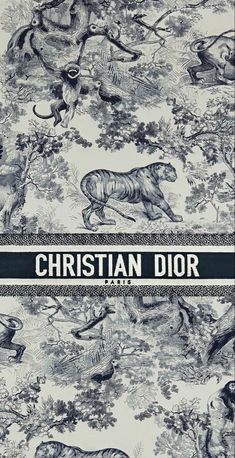 the cover of christian dior's book, with an image of elephants and other animals