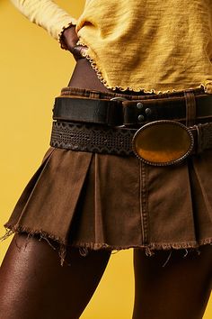 Cinch your waist and elevate your outfit with this bold belt featured in a classic silhouette and adjustable fit with embossed details, an oversized metal buckle, and pointed tip. | Duke Concho Belt by FP Collection at Free People in Brown, Size: S/M Layered Belts, Belts Aesthetic, Winter Glam, Belt Outfit, Cowgirl Halloween, Boho Ideas, Waist Belts, Buckle Top, Concho Belt