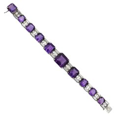 Van Cleef And Arpels diamond and amethyst line bracelet in platinum. The bracelet features 10 emerald cut amethysts graduating in size, alternating with 10 links consisting of 2 baguette and 2 hexagonal cut diamonds each. There is total of 20 baguettes and 20 hexagonal cut diamonds with total weight of approximately 9.00 carats, Inscribed: Van Cleef & Arpels, Stamped: French assay, maker's mark , PT950. Length: 7 inches. Width: 15mm – 10mm Van Cleef Bracelet, Cleef Bracelet, Purple Vans, Van Cleef & Arpels, Diamond Pendants Designs, Alexis Bittar Jewelry, Van Cleef And Arpels, Purple Bracelet, Girl Jewelry