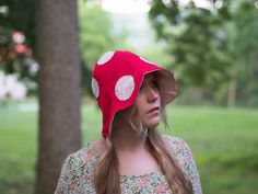 Sewn with 100% cotton (pre-shrunk) One size fits MOST If most hats are too big or too small for you, please contact me and I can create a custom size hat for you Whimsical Red Brimmed Hat, Fun Red Wide Brim Hat, Fun Red Bucket Hat, Whimsical Cotton Cap, Whimsical Red Hat With Curved Brim, Red Cap-shaped Sun Hat, Red Cotton Bucket Hat, Tulip Hat, Teal Pants