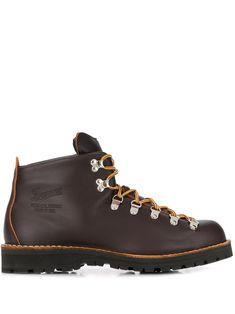 Dark brown leather Mountain Light boots from Danner featuring a hook & eye fastening, an oversize tongue, a front lace up detail, a ridged sole, a front embossed logo stamp and a round toe. Danner Boots, Danner Mountain Light, Light Boots, Dark Brown Leather, Logo Stamp