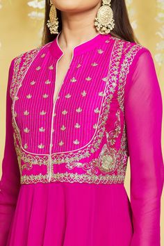 Pink silk flared anakali kurta adorned with dori embroidery on bodice. Comes with matching plain churidar and sequined dupatta.
Components: 3
Pattern: Embroidered
Type Of Work: Gota, Dori
Neckline: Mandarin Collar
Sleeve Type: Churidar
Fabric: Silk
Color: Pink
Other Details: 
Threadwork placket
Pleated flared anarkali waist
Buttoned kurta cuff
Occasion: Wedding,Sangeet - Aza Fashions Flared Anarkali, Dori Embroidery, Embroidered Bodice, Fabric Silk, Churidar, Pink Silk, Embroidered Silk, Mandarin Collar, Set For Women