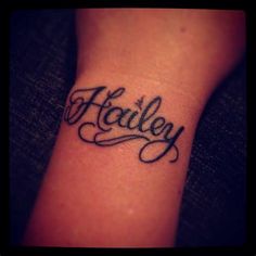 a tattoo with the word harley on it