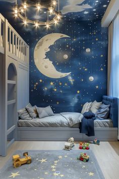 a child's bedroom decorated in blue and white with stars and the moon painted on the wall