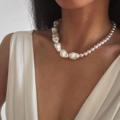 B A R O Q U E ∙ P E A R L ∙ C H O K E R 💎Features: * High Quality Materials: High Luster Glass Baroque Pearl, Brass Hardware * Pearl Size:    Baroque Pearls: approx 15x20mm, Irregular   Round Pearls: 8mm * Color: White Pearl, Nice Light Gold Hardware, Tarnish Free * Length: from 14 to 26 inches, plus 2.5 inches extension chain. Please contact us if any special request. * Closure: Lobster Claw * Shipped with a Gift Box. Each order comes with a special surprise gift⭐  * Handmade with love & care Big Pearl Necklace, Chunky Pearls, Pearl Statement Necklace, Big Pearl, Pearl Choker, Pearl Size, Baroque Pearls, Surprise Gifts, Pearl White