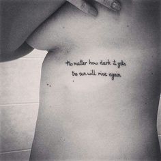 a woman's back with the words, no matter how dark it goes and the sun will rise again