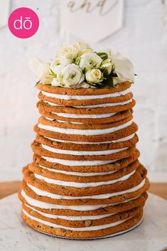 a large stack of cookies sitting on top of a table