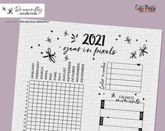 a planner with the words 2021 year in pixels written on it, and an image of a