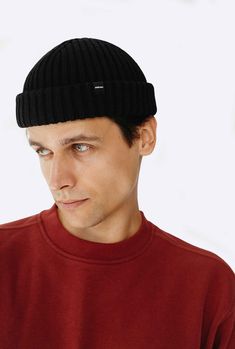 The classic Black Fisherman Beanie style is a timeless accessory for everyone. Whether you're going for a hike, a run, or simply running errands around town, this Mens Fisherman Beanie is the perfect addition to your collection. Embrace comfort, fashion, and functionality with this iconic Black Fisherman Beanie.          * Material: 50% Merino Wool/ 50% Acrylic        * Color Shown: Black A double rib knitted Black Merino Wool hat is the perfect hat to wear in any cold place. This beanie is spec Casual Windproof Beanie For Streetwear, Casual Black Beanie With Short Brim, Black Beanie With Short Brim For Outdoor, Classic Black Hat For Outdoor Activities, Casual Black Beanie For Everyday, Adjustable Black Windproof Beanie, Casual Black Beanie, Casual Black Everyday Beanie, Classic Black Beanie Cap