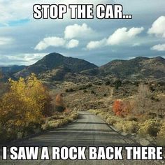 an empty road with mountains in the background and text that reads, stop the car i saw a rock back there