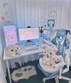 two teddy bears are sitting on a chair in front of a desk with a computer