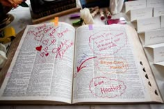 an open book sitting on top of a table