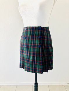 "Great vintage condition! Measures about 26\" inch waist, 15\" inch mini length" Vintage Pleated Mini Skort, Vintage Plaid Pleated Skirt, 60s Plaid Skirt, Retro Plaid Mini Skirt Bottoms, Retro Plaid Mini Skirt, Uniform Fashion, Plaid Mini Skirt, Green Plaid, Wrap Skirt