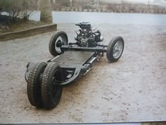 an image of a car with four wheels on the ground