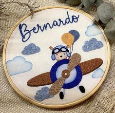 a cross stitch pattern with an airplane and the words bernadu on it