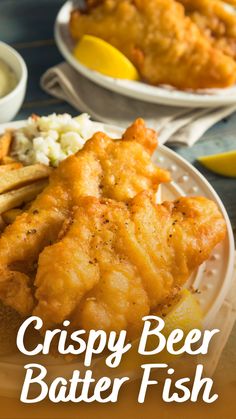 crispy beer battered fish served with fries and lemon wedges