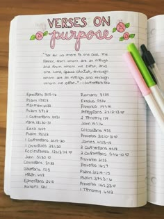 a notebook with the words verses on purpose written in cursive writing and colored pencils