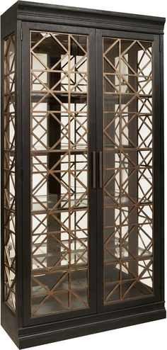 an ornate display cabinet with glass doors and metal bars on the front, in black finish